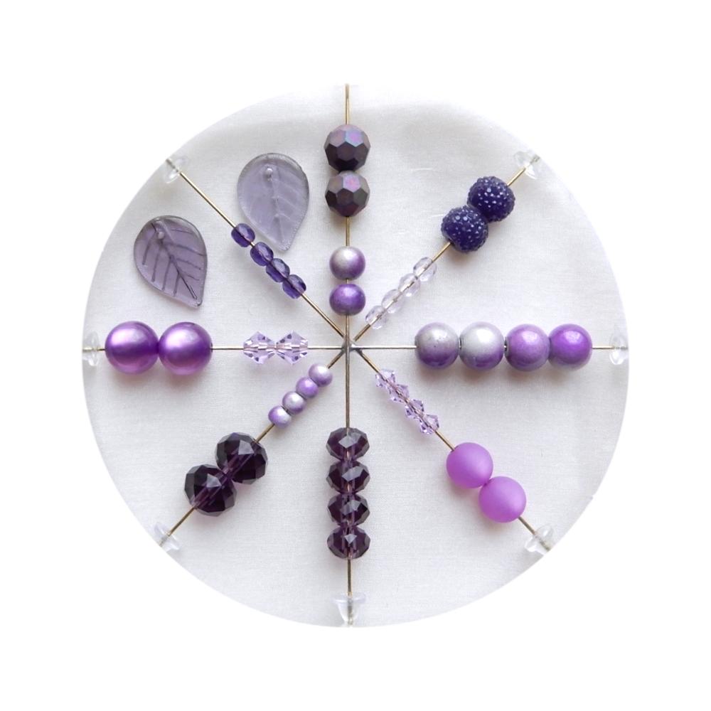 Assortiment de 40 perles tons lilas